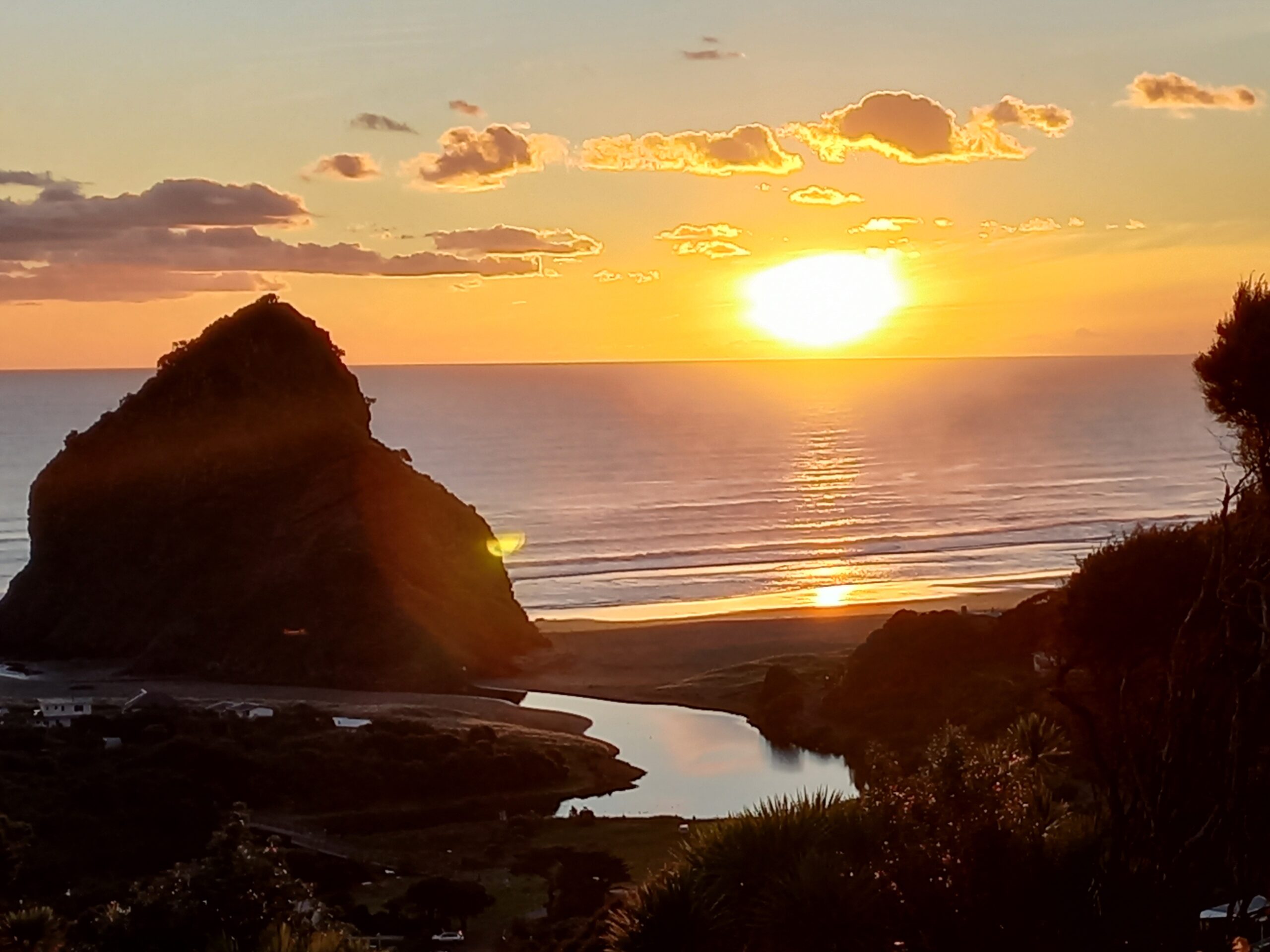 Photo of Piha is a village, west of Auckland, on New Zealand’s North Island. Black-sand Piha Beach is known for its strong surf and rugged scenery. Lion Rock is a volcanic monolith with war memorials and Maori carvings.